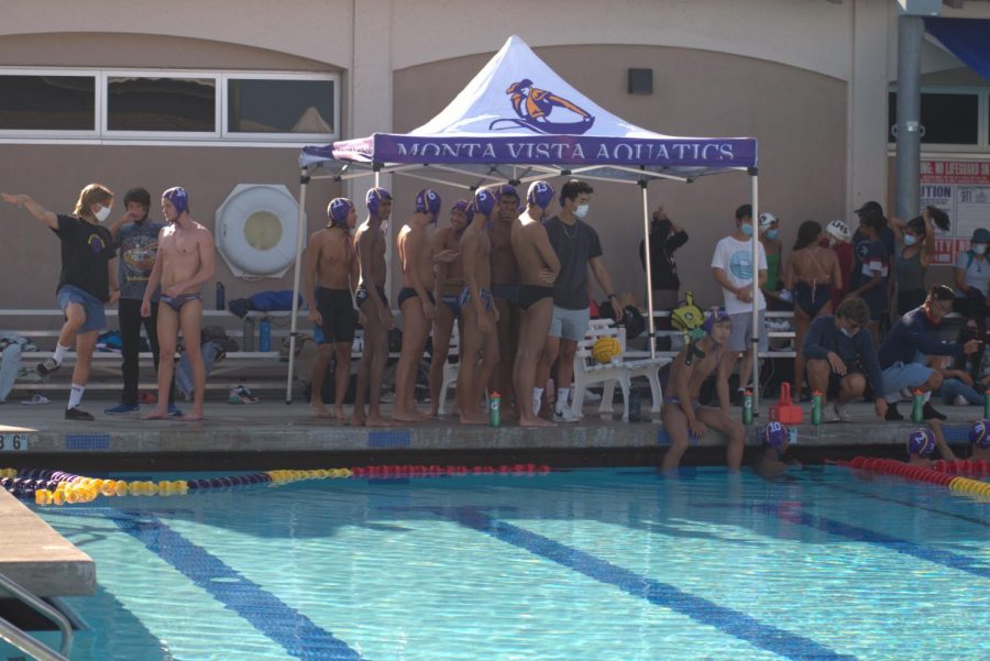 The MVHS boys water polo team discusses strategy at half time. 