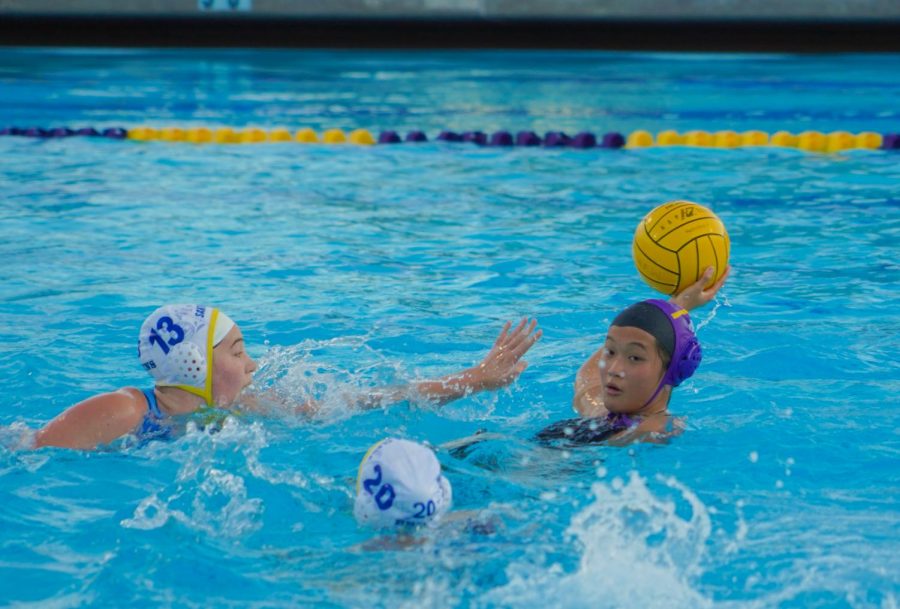 Senior Sophia Fu swims backwards to distance herself from SCHS players before passing the ball.
