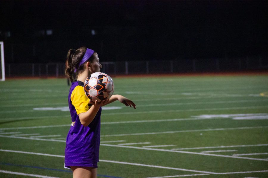 Freshman Maya Gallo looks for an open player to throw the ball to in the first half. 