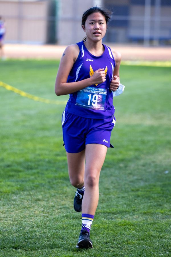 Junior Sophia Chen runs at her first cross country meet at Los Altos High School during the 2021 cross country season.