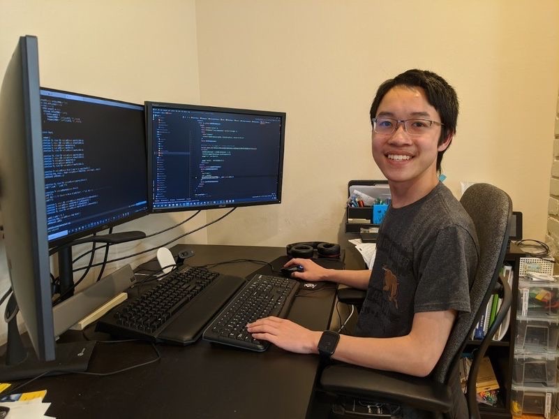 At his personal desk, senior Nathan Wang prepares to continue coding one of his many projects. Photo by Jimmy Wang // Used with permission
