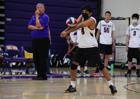 Sophomore Varchas Athreya passes the ball in the first set of the game, which MVHS won 26-24.