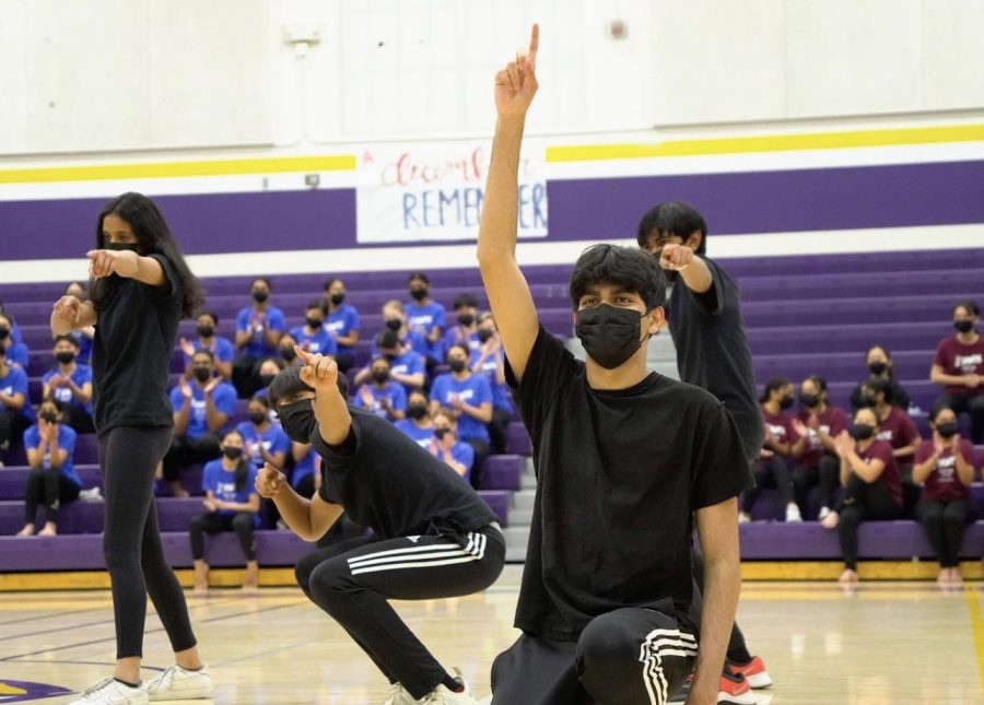 Senior Rudra Phalnikar poses at the end of the routine during MV Dance Teams December to Remember showcase. 