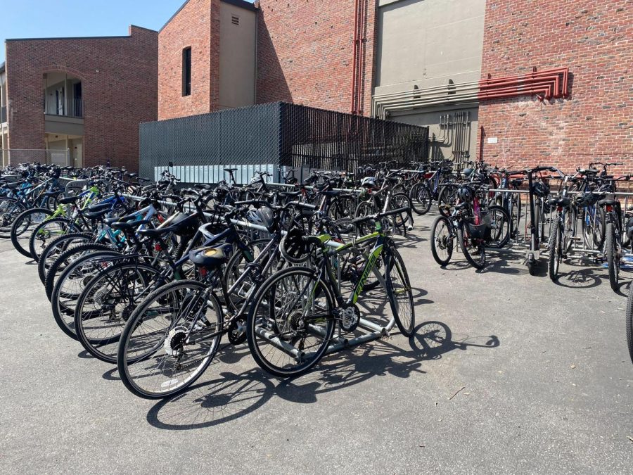 Students leave their bikes at the bike racks. 