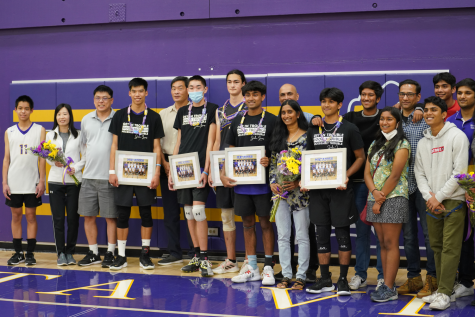 Seniors Arthur Chan, Lance Tong, Neil Weaver, Rishi Dasari and Sudhit Rao pose together with their family members and their gifts.