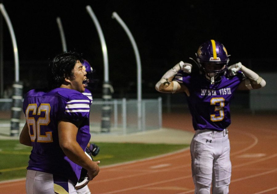 Seniors Jeremiah Lo and Alex Lee flex after making the final touchdown of the game against SHS on Friday, Sept. 30. MVHS won with a score of 45-32. Photo by Lily Jiang