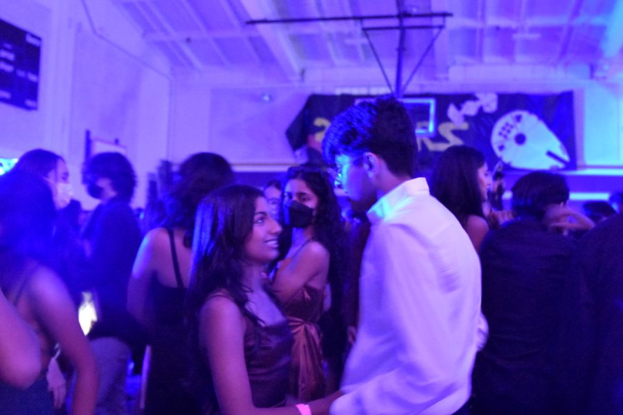 Nirbhay Saluja and Palak Bassan talk to each other during Homecoming. 