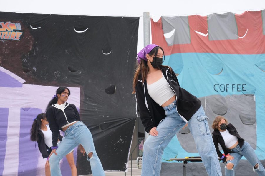 Freshman Courtney Masli strikes a pose during the girls’ dance. 