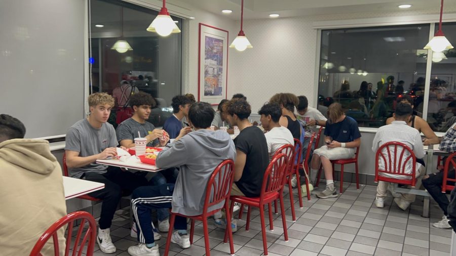 Monta Vista Football team celebrates their win against Saratoga High School at In-N-Out on Friday, Sept 30. 