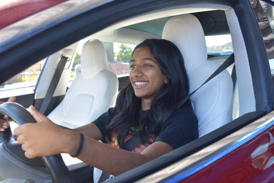 Senior Nikhita Saldi drives her Tesla into school. 