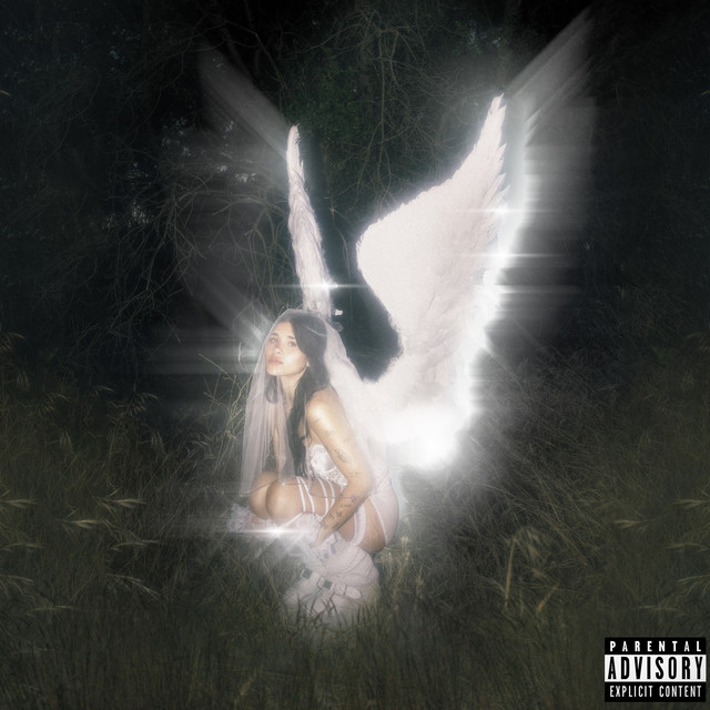 The young forever album cover features Nessa Barrett in angel wings, with an angelic aura surrounding her 
