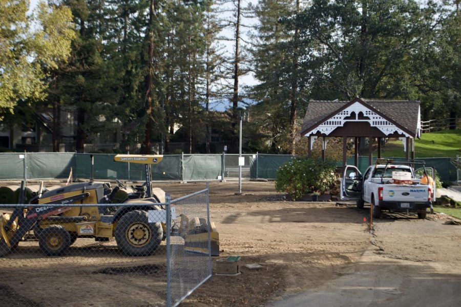 Construction vehicles are parked at the previous pond area of Memorial Park, one of the Cupertino parks undergoing refurbishment.