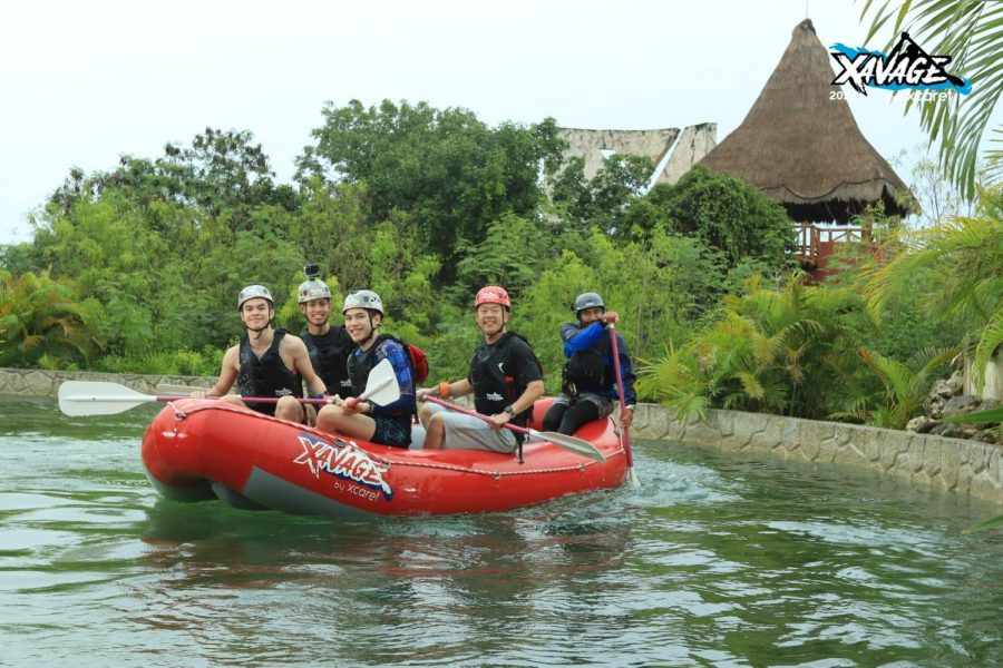 Senior Marcus Praseuth and his family row a whitewater rafting boat during their vacation in Cancun.