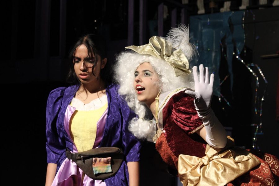 Iris, played by junior Ananya Nadathur, stares solemnly at the floor as Gretta Good, played by senior Jiya Singh, attempts to lift her spirits.