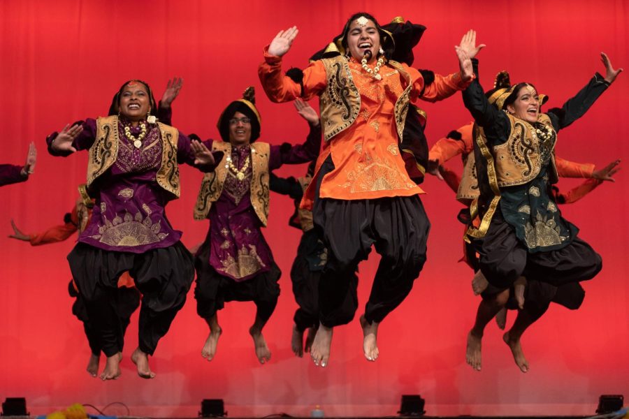 MV Bhangra jumps in unison during their performance in the show “Spotlite on India.” Photo by Krish Dev