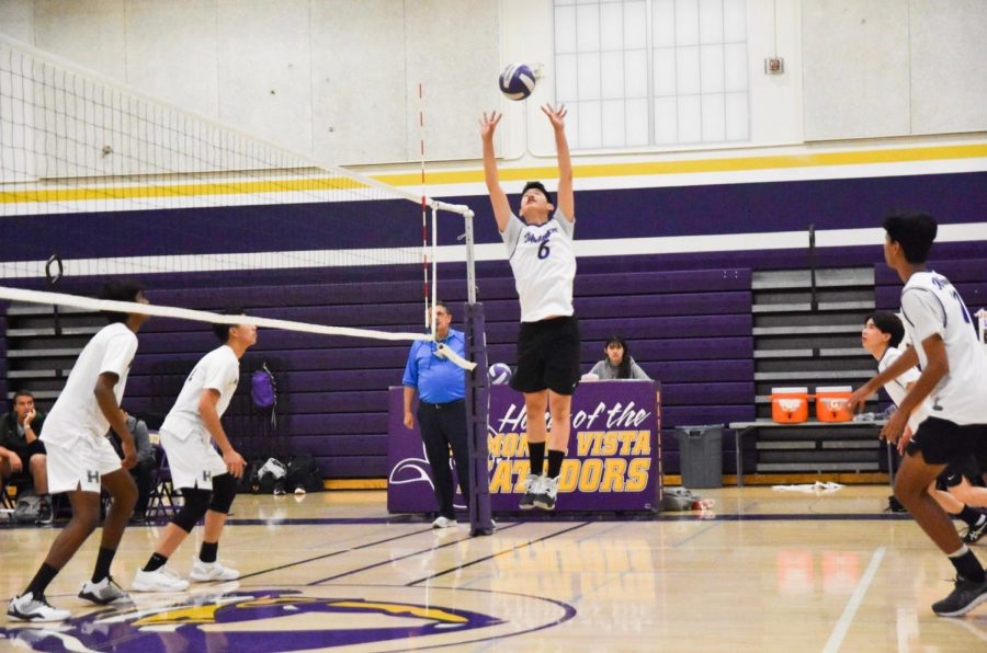 Junior and setter Henry Hu sets the ball to the middle hitter. Photo by Sagnik Nag Chowdhury
