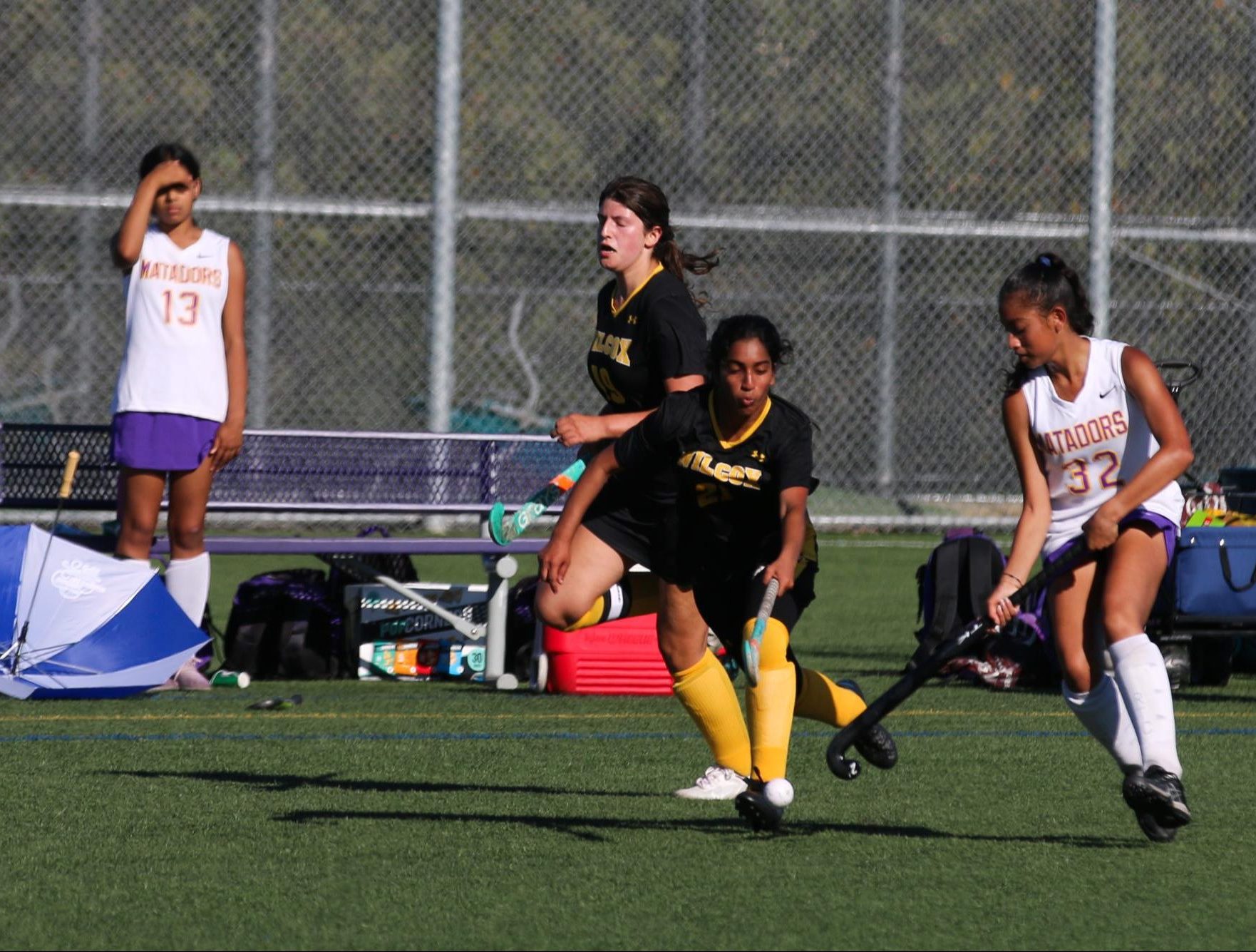 Sophomore Monisha Preetham attempts to gain possession of the ball from an opponent.