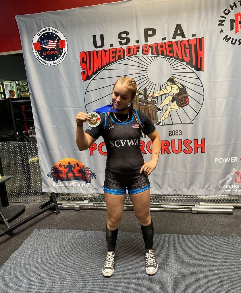 Darya Pereverzeva poses with her first place medal at the USPA Powercrush Summer of Strength 2023. Photo courtesy of Darya Pereverzeva
