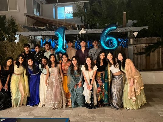 Junior Siyona Kathuria and her friends pose for a photo dressed in traditional Indian clothing for her 16th birthday party. Photo courtesy of Preeti Kathuria.
