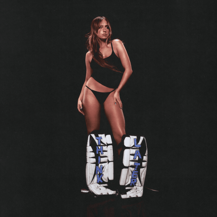 The THINK LATER album cover features McRae decked out in shin guards with THINK LATER painted on them in blue letter. Album cover owned by RCA