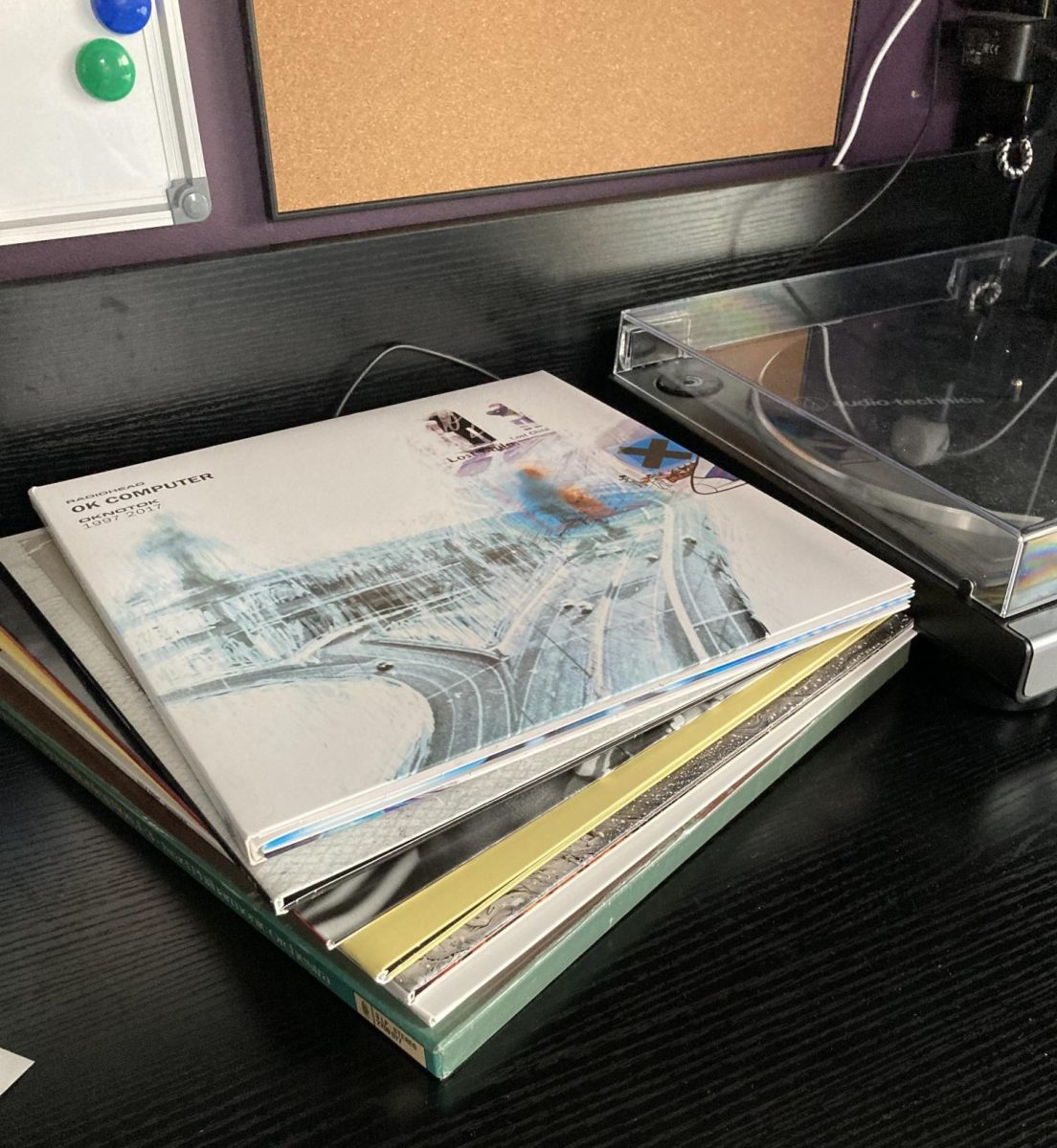 A stack of Junior Dhruva Ramachandran’s record collection next to his record player. Photo by Dhruva Ramachandran. Used with permission.