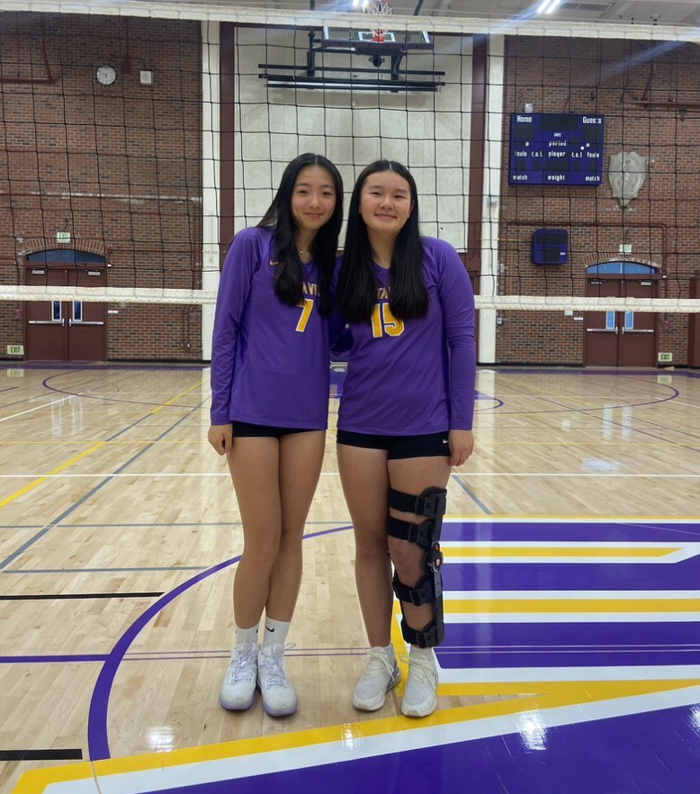 Chloe Chen (left) posing for a picture with Victoria Woo (right) during media day. 