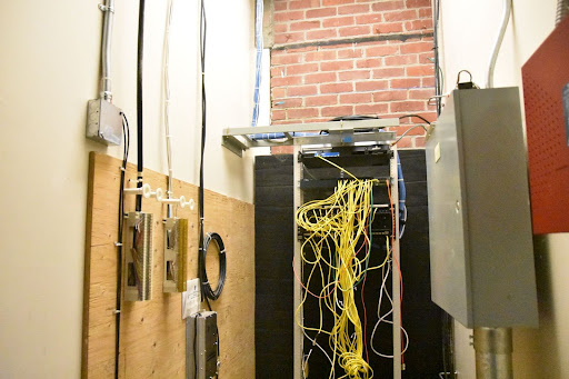 The electrical room located in the corner of the band room manages the Wi-Fi for the department. 