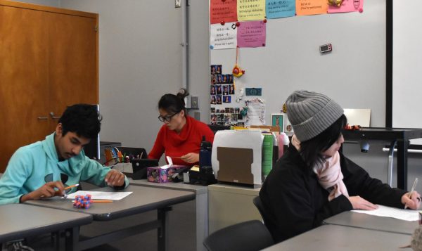Students in Lius Chinese class taking a test during a Monday tutorial.