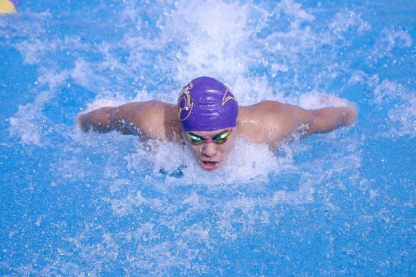 Senior Leo Matsumoto swims the 200-yard IM with a time of 25.62 seconds.