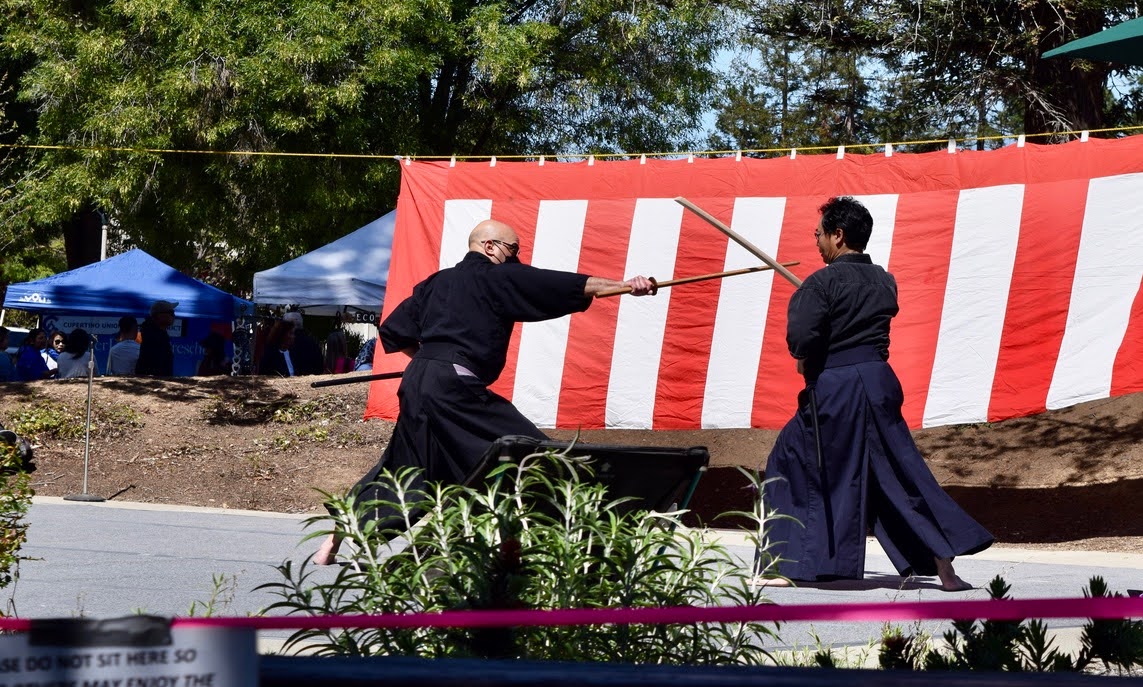 Members of the Suio Ryu Iai Kenpo USA group demonstrate “suio ryu” techniques, an ancient form of martial arts, on Memorial Park’s outdoor stage.