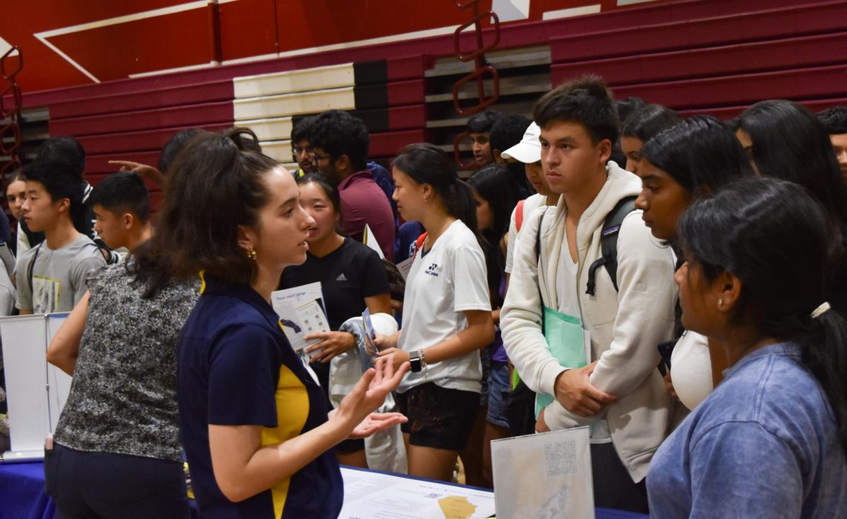 U.C. Davis Representative Peyton talks to students interested in the school.
