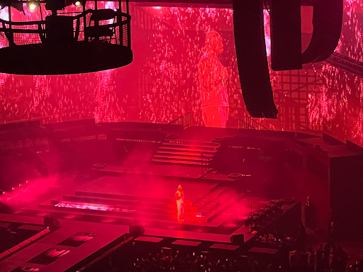 Future walks across the stage as the introduction to “Turn on the Lights” starts. The song was performed against an enamored Oakland Arena stage with a ruby, pétillant backdrop. Photo by Samika Bhatkar | El Estoque