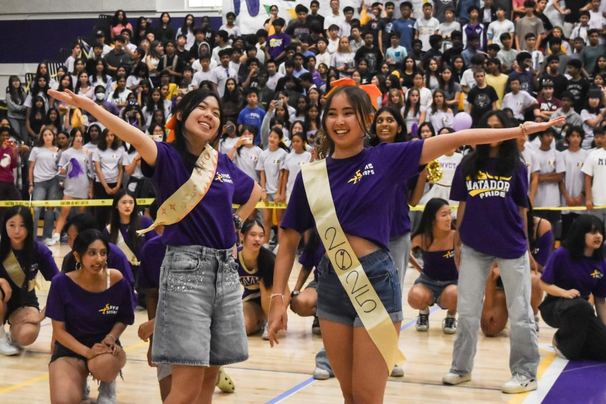 Seniors Katie Wang and Sophie Minogue strike a pose during the senior co-ed dance.

Photo by Sophia D’Sa