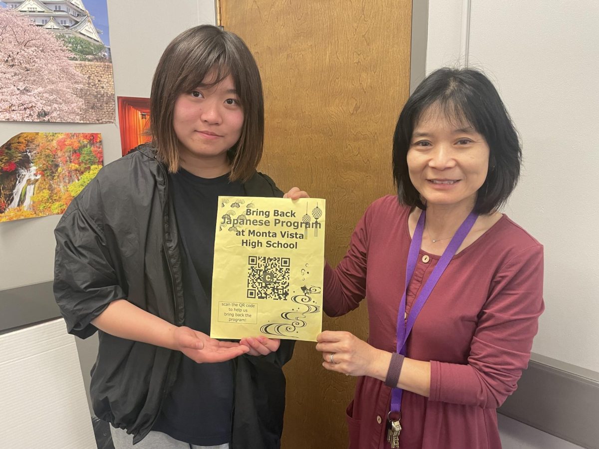 Rongyi Lin and Chiaki Vanasupa hold the Bring Back Japanese poster | Photo by Ethan Eisler