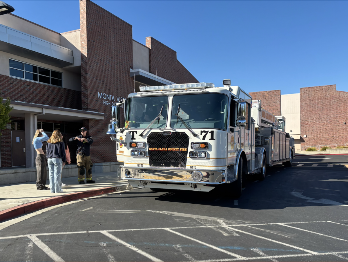 A fire truck parks outside the main entrance following a false fire alarm.