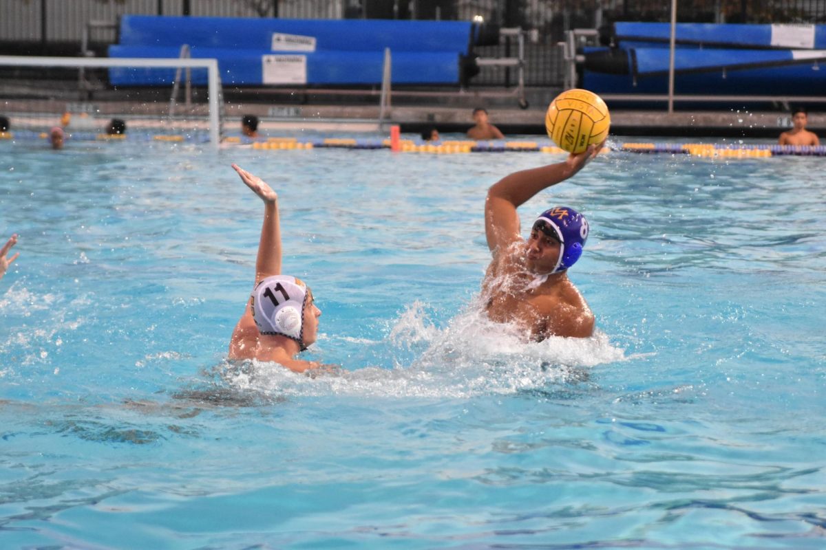 Junior Suhan Hajela attempts to score on a Cupertino High School defender.