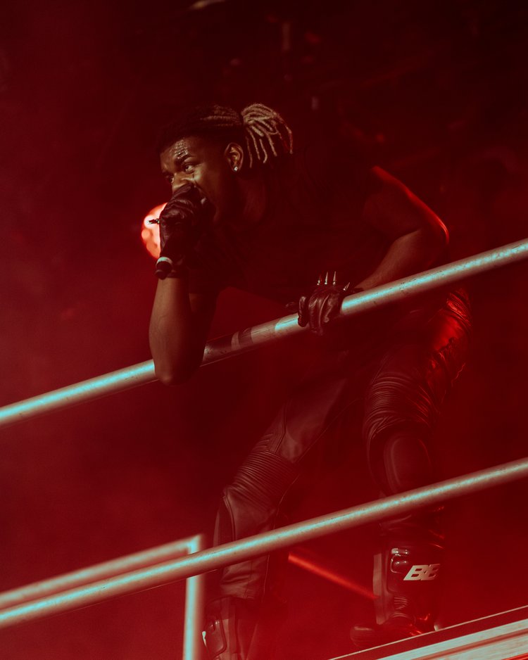 Rapper Ken Carson performed atop a stage constructed of steel poles throughout the night. Photo by Trey Karson | Used with permission