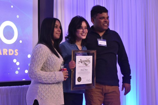 Senior Sudisha Kumar poses with family members for a photo after the awards ceremony. Photo | Jillian Ju