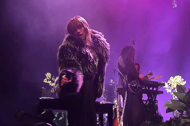 Waterhouse reaches out to the audience as she performs 