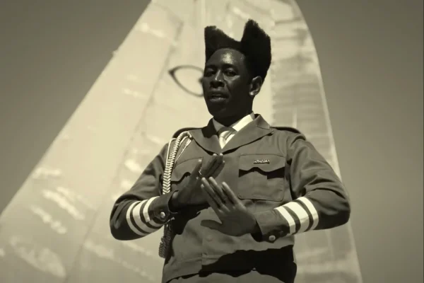 Tyler, the Creator poses on top of an airplane as he sings in the music video for "Thought I Was Dead".  Photo Courtesy of Columbia Records | Used with permission