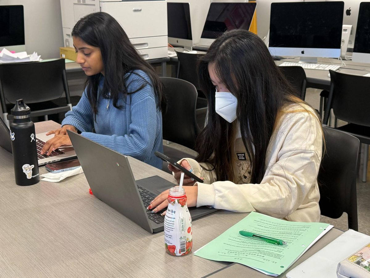 Students often use their computers to replace their phones during class, voiding the purpose of the cell phone ban. | Photo by Niveda Hari
