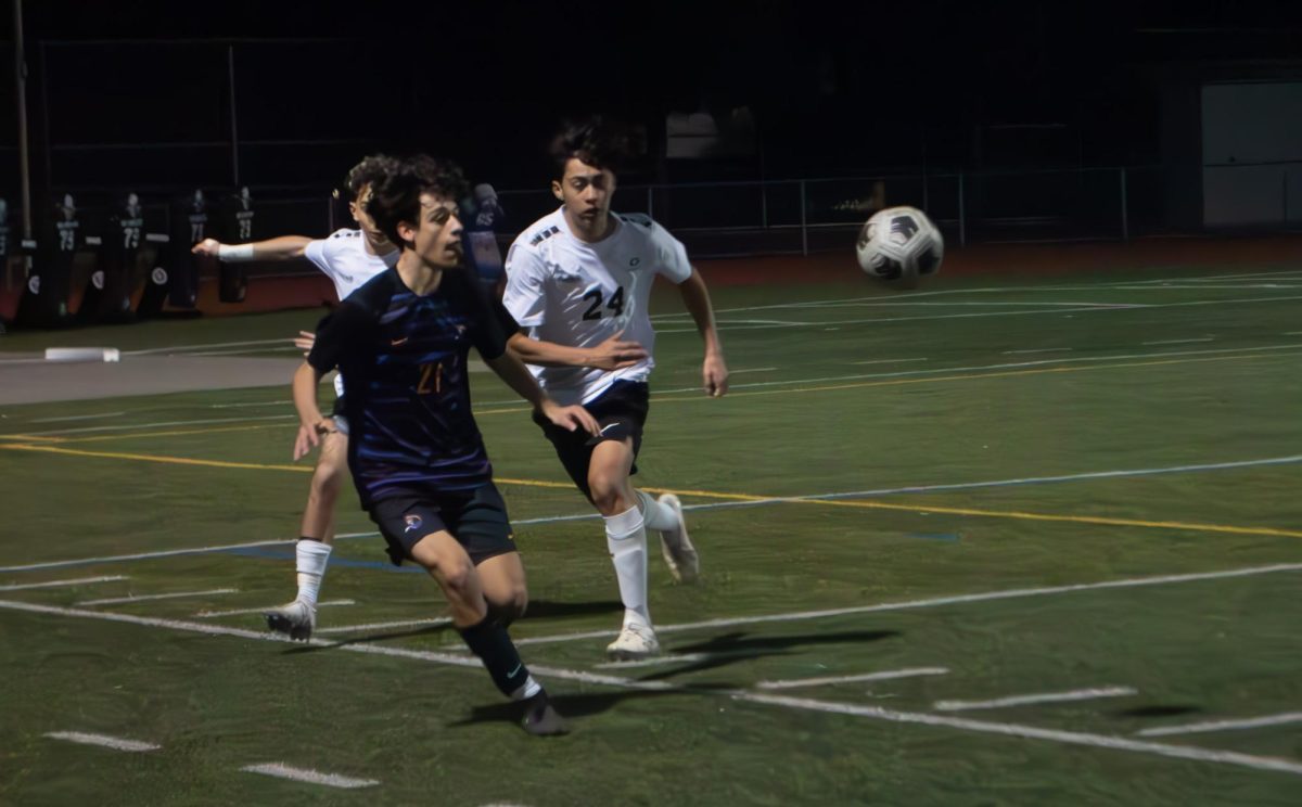 Sophomore Lewly Tzankov receives a pass,  intercepting a GHS defender.