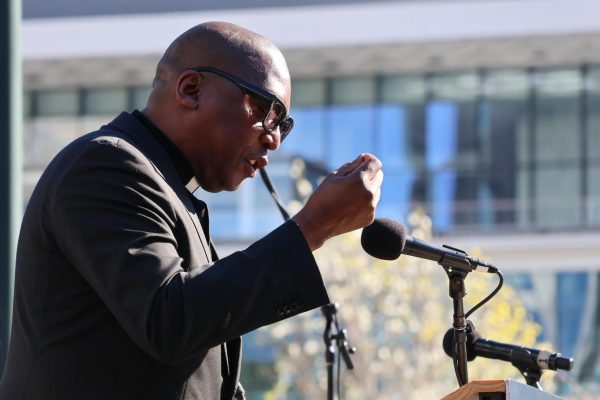 Reverend Marvin White delivers an address to the gathering of march participants at Yerba Buena Gardens. Photo | Benjamin Zhang