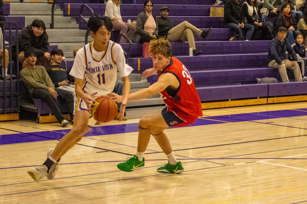 Junior and forward Ryan Shen dribbles past an opponent. Photo | Ethan Eisler