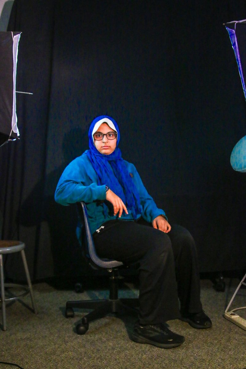 Junior Mariam Mansour sits in a chair. Photo | Liz Liu