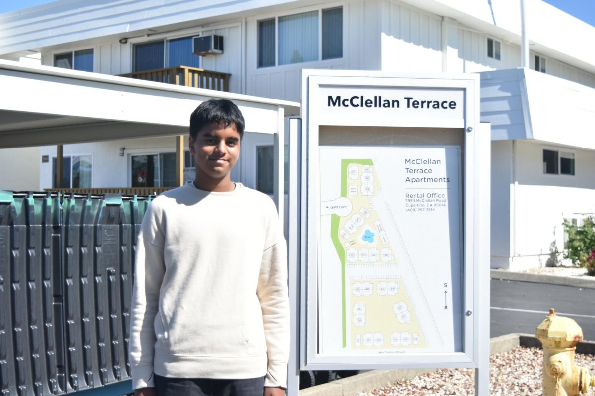 Sophomore Harshith Nelluri stands in front of Cupertino’s McClellan Terrace Apartments. Photo | Owen Liu