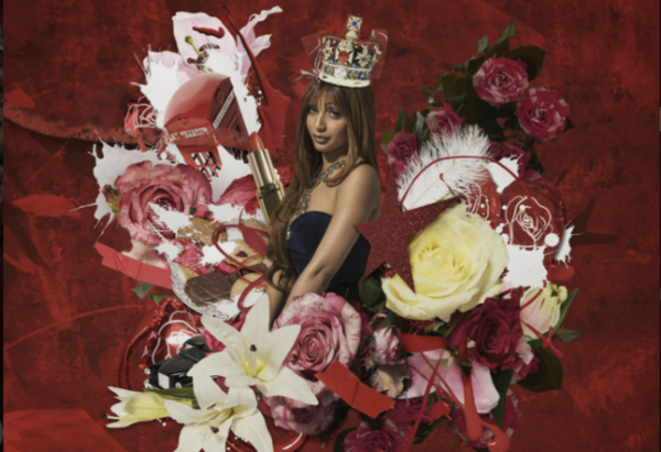 PinkPantheress poses amongst a sea of flowers for the cover of "Fancy That." Courtesy of Warner Brothers | Used with permission