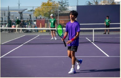 Freshman and doubles player Aditya Kumar strides across the court between points in MVHS’s match against Palo Alto High School on Thursday, April 3, where they secured a 5-2 win. 