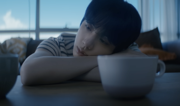 Jin reminisces about a past lover in the music video for “Don't Say You Love Me.” Photo courtesy of Big Hit Music | Used with permission