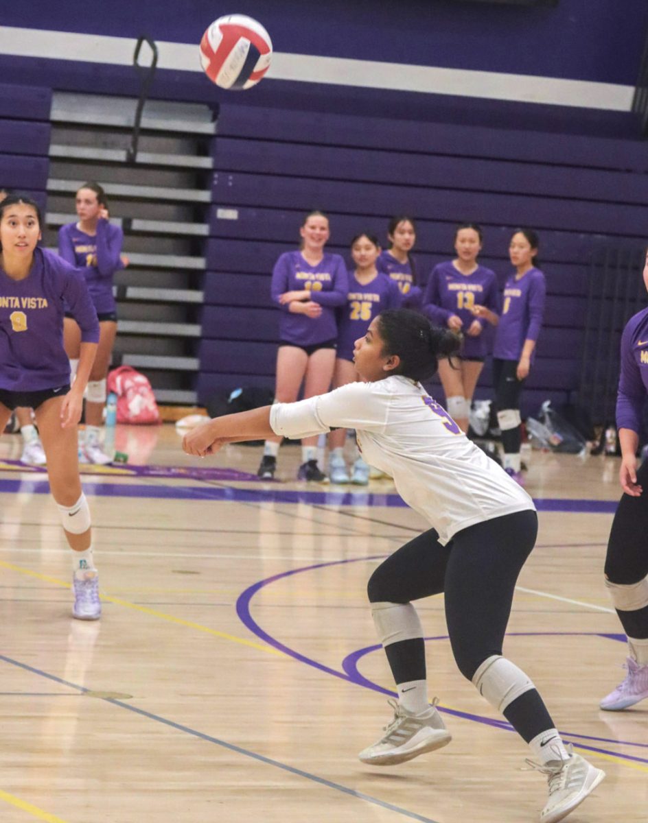 Sophomore and libero Srahi Bobilli receives a serve in a game against Homestead High School on Oct. 14 where the team narrowly fell 3-2. Photo | Liz Liu